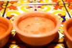 del maguey mezcal A clay sipping cup filled with mezcal from Del Maguey, the Distiller of the Year. | Photo: Lush Life Productions