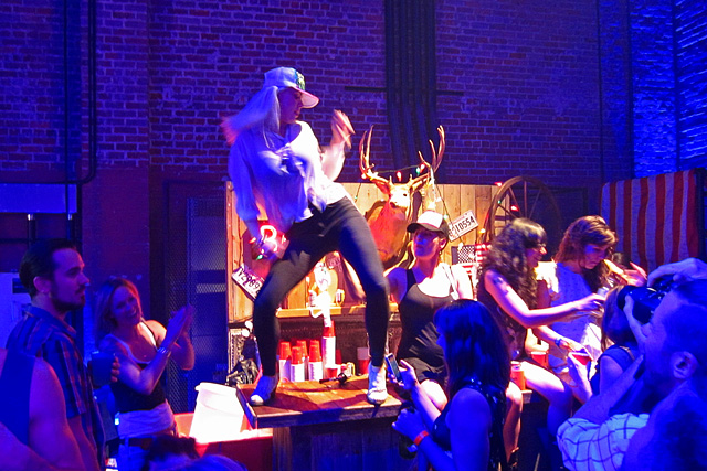 Beckaly Franks dances on top of the "Coyote Ugly" bar