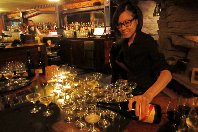 Cari Hah pours champagne at Clifton's Cafeteria